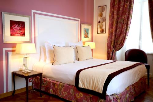 邦瑞珀斯皇家酒店客房内的一张或多张床位