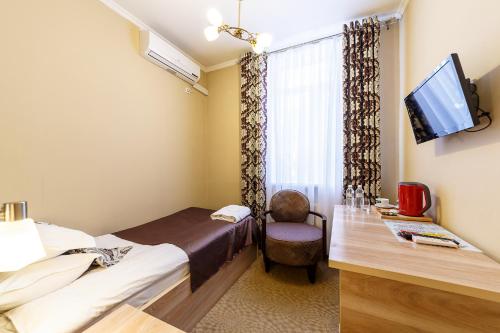 瑞尼奥兹力哈酒店客房内的一张或多张床位