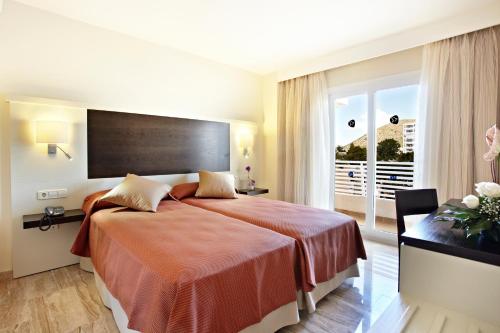 阿尔库迪亚港集团酒店客房内的一张或多张床位