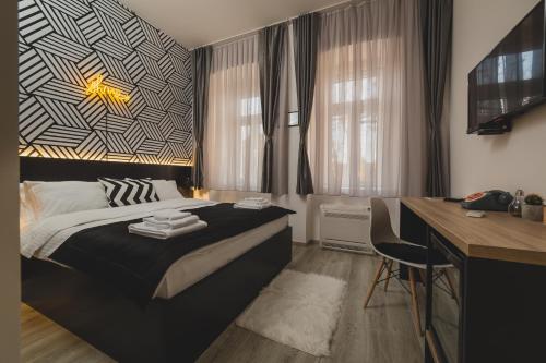 Hotel Marienplatz Podgorica客房内的一张或多张床位