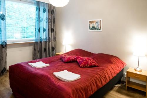 Apartamentos Joensuu - Kauppakatu 9客房内的一张或多张床位