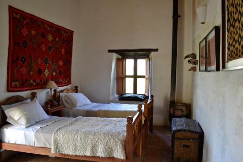 Casa del Tejedor客房内的一张或多张床位