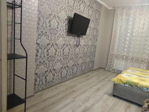 Apartamenty Otel36 Leninskiy Prospekt的电视和/或娱乐中心