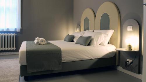 Villa Gotti Charming Rooms客房内的一张或多张床位