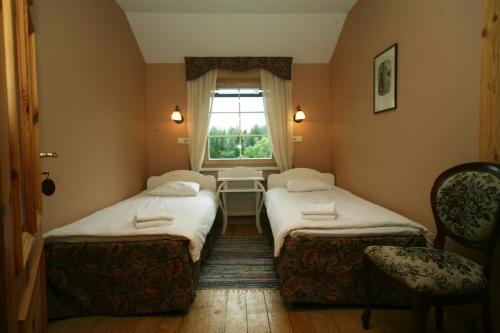 马尔西纳斯暮萨&温泉客房内的一张或多张床位