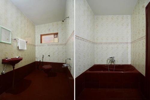 马尼帕尔Guest Nest的带浴缸、卫生间和盥洗盆的浴室