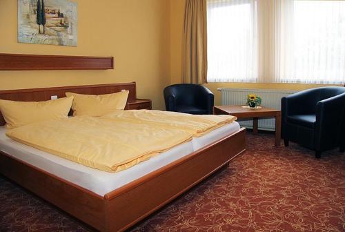 瓦尔德城堡酒店客房内的一张或多张床位