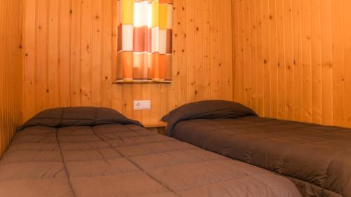 Camping Ametlla客房内的一张或多张床位