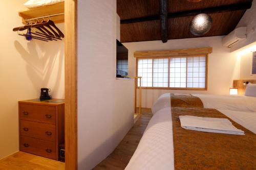 京之宿月光庵客房内的一张或多张床位
