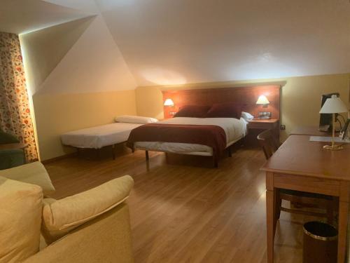 卡米诺里尔酒店客房内的一张或多张床位
