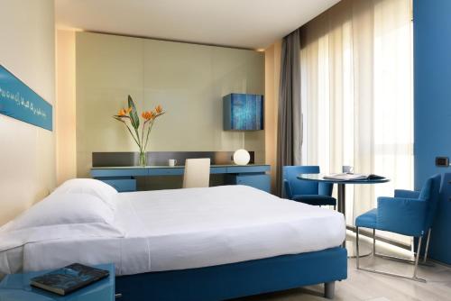 UNAHOTELS Bologna Centro客房内的一张或多张床位