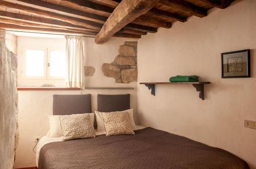 Il Castello Gavorrano客房内的一张或多张床位