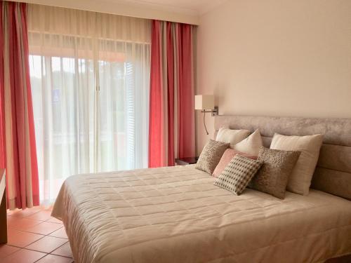 Casa de Férias Vila Sol Golf客房内的一张或多张床位