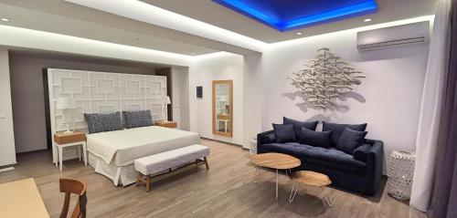 Villaggio Boutique Hotel Hersonissos - Adults Only客房内的一张或多张床位