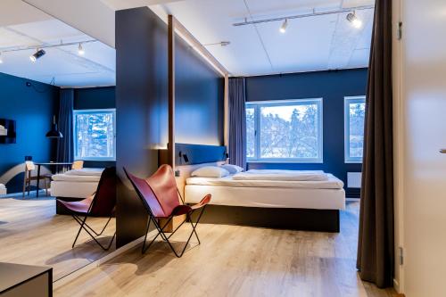 Hotel Stockholm North by FIRST Hotels客房内的一张或多张床位
