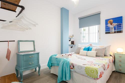 Apartamento Mar de Cadiz客房内的一张或多张床位