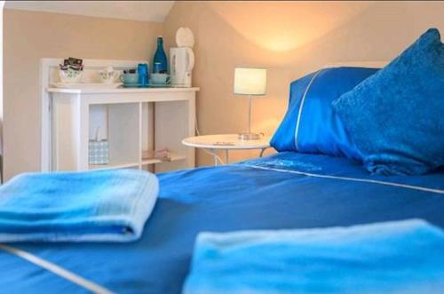 Cleeves Cottage客房内的一张或多张床位