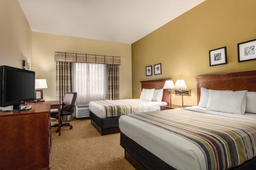 南达科他州达科他沙丘卡尔森江山旅馆客房内的一张或多张床位