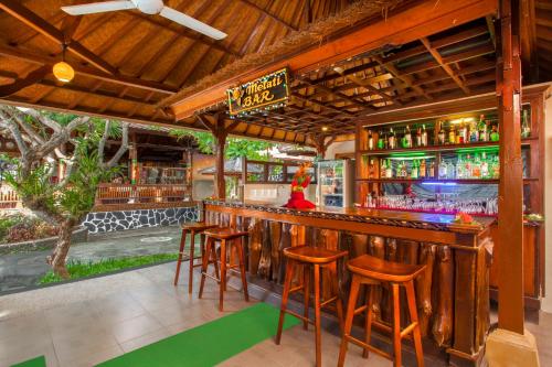 巴厘岛塔曼海滩及Spa罗维纳度假酒店酒廊或酒吧区