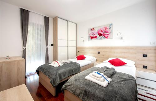 Ratkajec Luxury Apartments客房内的一张或多张床位
