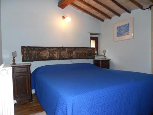 Il Giardino Degli Ulivi客房内的一张或多张床位
