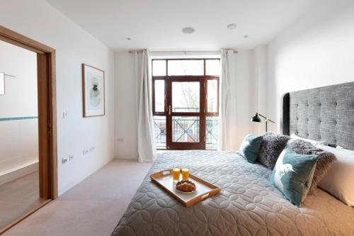 Hampden Apartments - The Charles客房内的一张或多张床位
