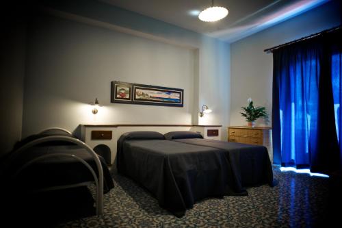 科拉罗酒店客房内的一张或多张床位