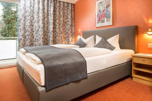 Wohlfühlhotel Alpenrose客房内的一张或多张床位