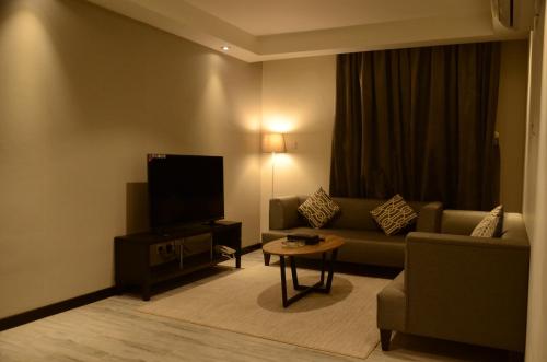 منازل الشمال للشقق المخدومة Manazel Al Shamal Serviced Apartments的休息区