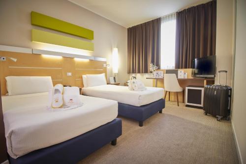iH Hotels Milano Gioia客房内的一张或多张床位