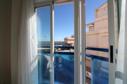 奥利瓦Apartamento con piscina y vistas al mar Aguamarina 36的相册照片