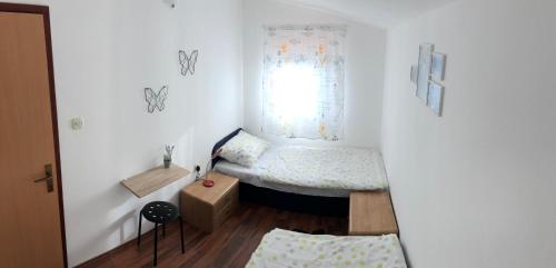 Andrija Apartment客房内的一张或多张床位