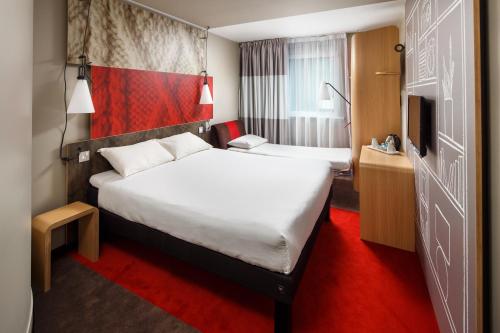 宜必思格拉斯哥市中心萨切霍街酒店客房内的一张或多张床位