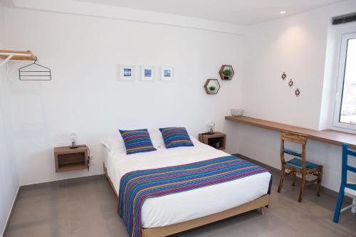 Cocor Suites & Design客房内的一张或多张床位