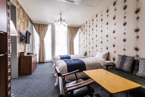 Incheon Aiport Airrelax hotel客房内的一张或多张床位