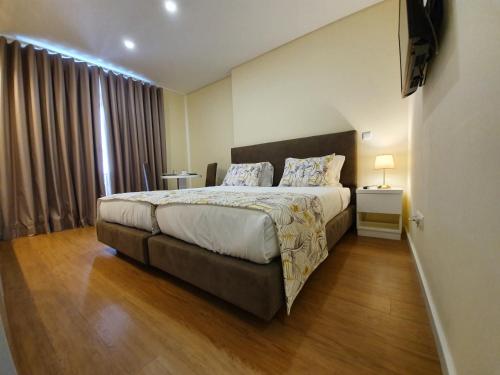 Agnelo Comfort - Accommodation H V客房内的一张或多张床位