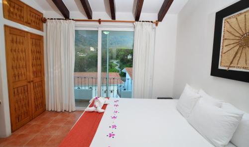 Pacifica Resort Ixtapa客房内的一张或多张床位
