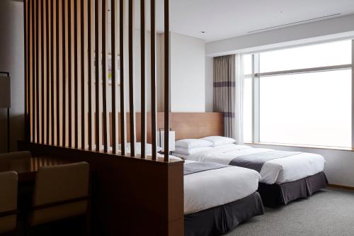 Lahan Hotel Pohang客房内的一张或多张床位