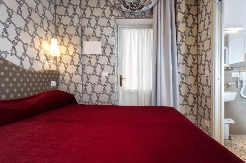 凯诺比利考勒讷酒店客房内的一张或多张床位