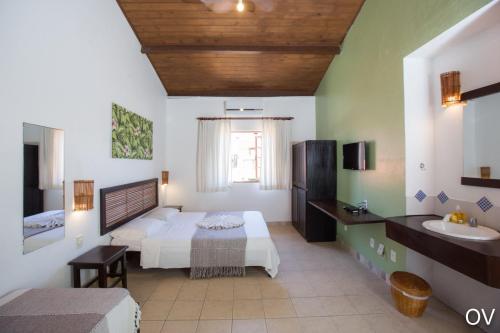 普拉亚多海滩旅舍客房内的一张或多张床位