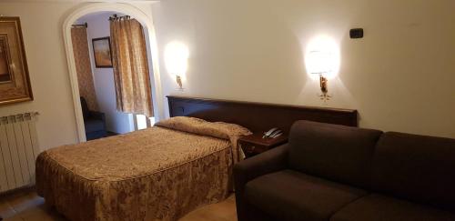 Hotel Vitalba客房内的一张或多张床位