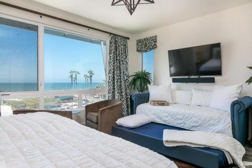 因皮里尔滩Ocean View 3 Bedrooms Condo, just steps from the park, pier & water!的相册照片