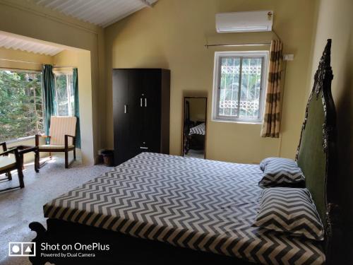Leela's Cottage客房内的一张或多张床位