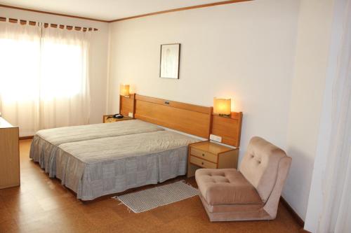 博玛苏克索酒店客房内的一张或多张床位