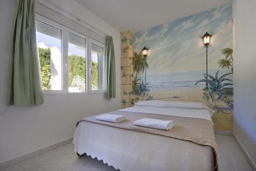 哈维亚Villa Cora的一间卧室配有一张壁画床