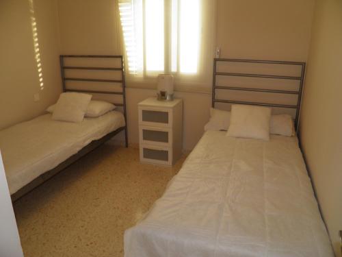 Alojamiento Los Corrales客房内的一张或多张床位