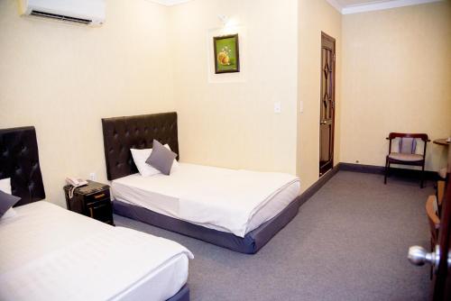 Ha Trinh Hotel客房内的一张或多张床位