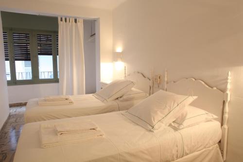 胡安妮塔旅馆客房内的一张或多张床位