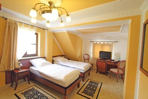 托斯卡纳别墅酒店客房内的一张或多张床位