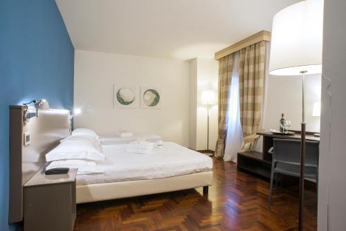 Locanda Giustini客房内的一张或多张床位